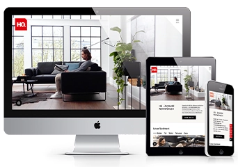 HQ-Website auf verschiedenen Endgeräten dargestellt: Desktop, Tablet und Smartphone.